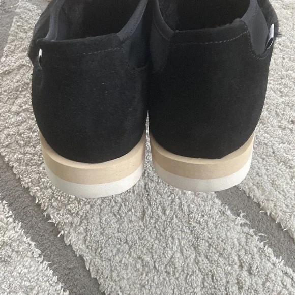 P448 bubble Genuine shearling slip on sneakerin black